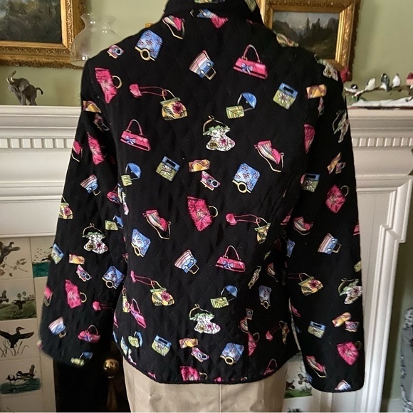 Quilted jacket by requirements with purses galore all over on a field of black. - Picture 4 of 5
